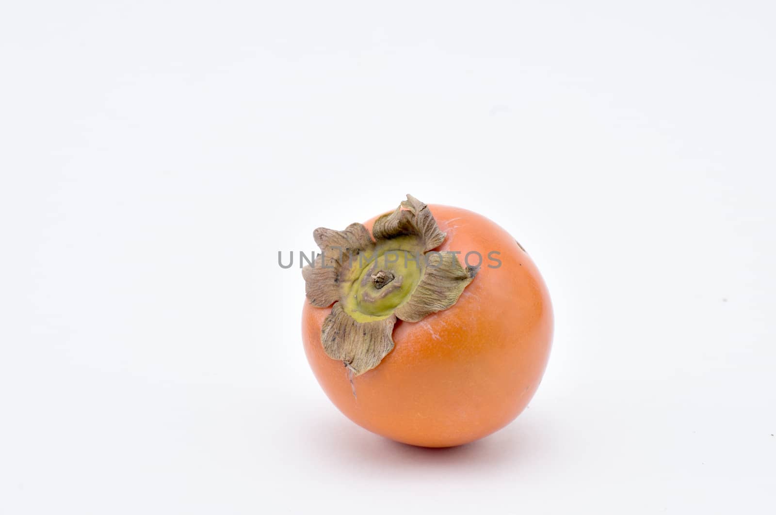 Persimmon on a white background.Natural.For Isolation. by moviephoto