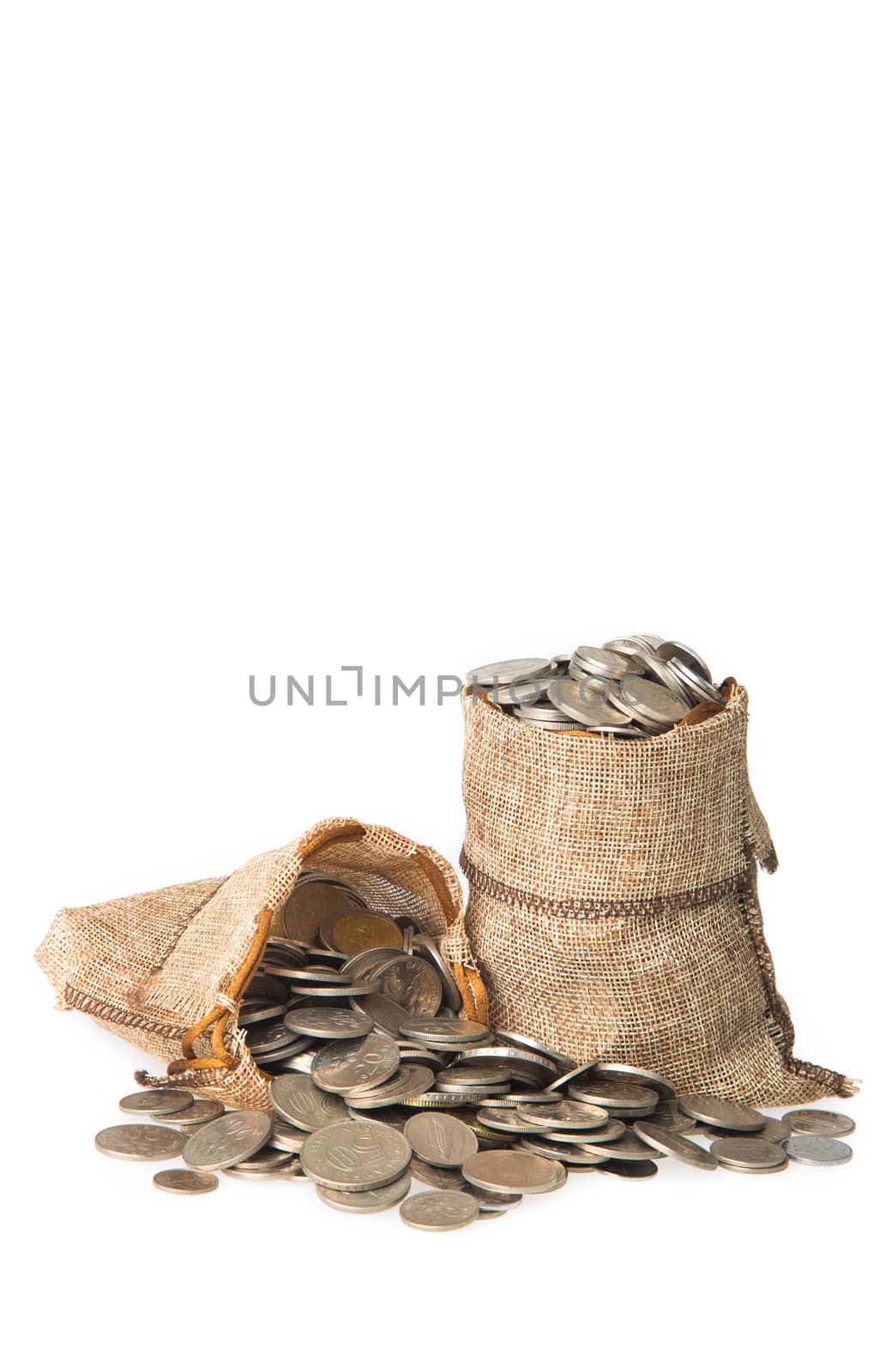 coin in gunny bag isolated on white background