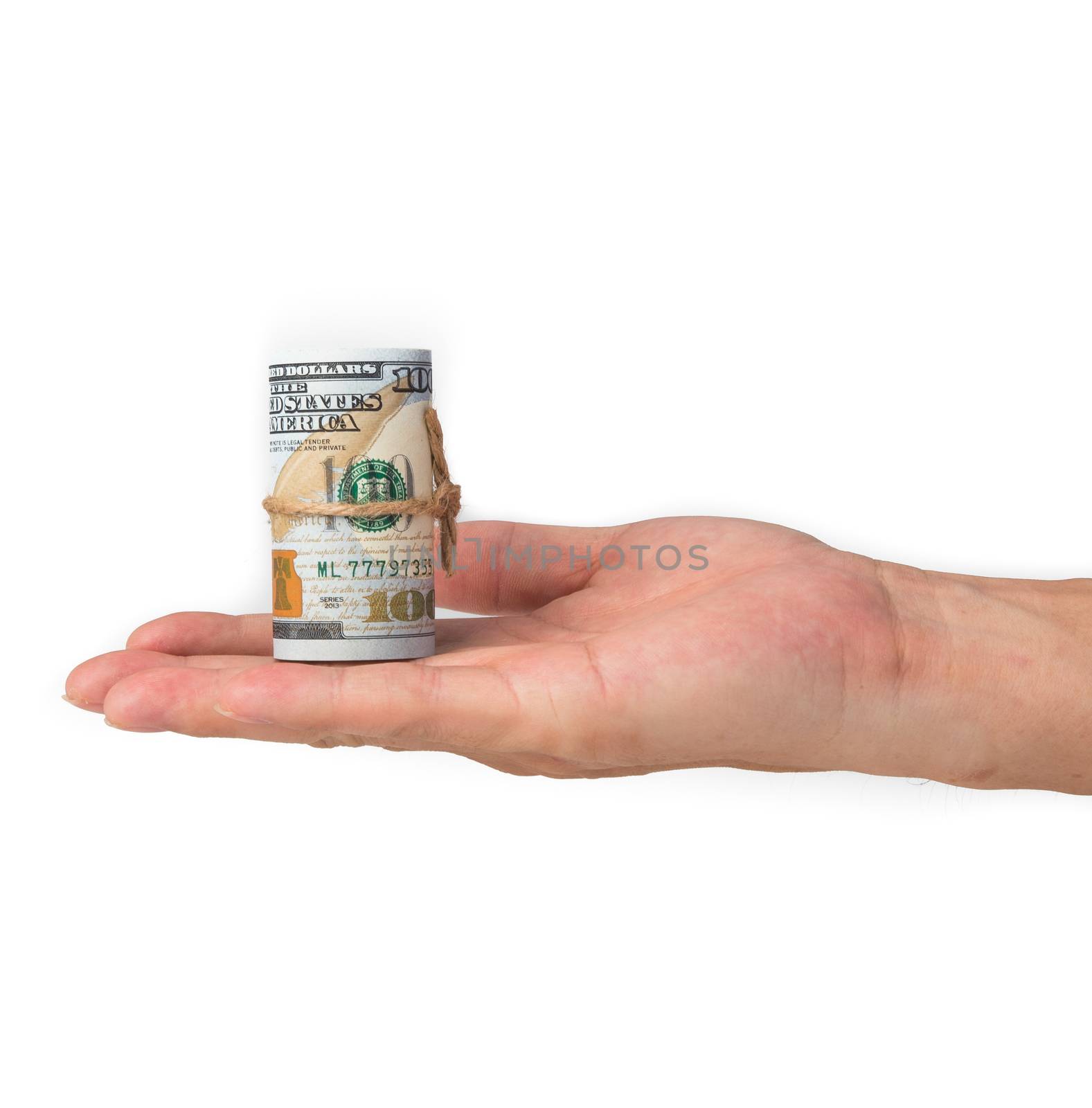 man hand holding a roll of 100 usd