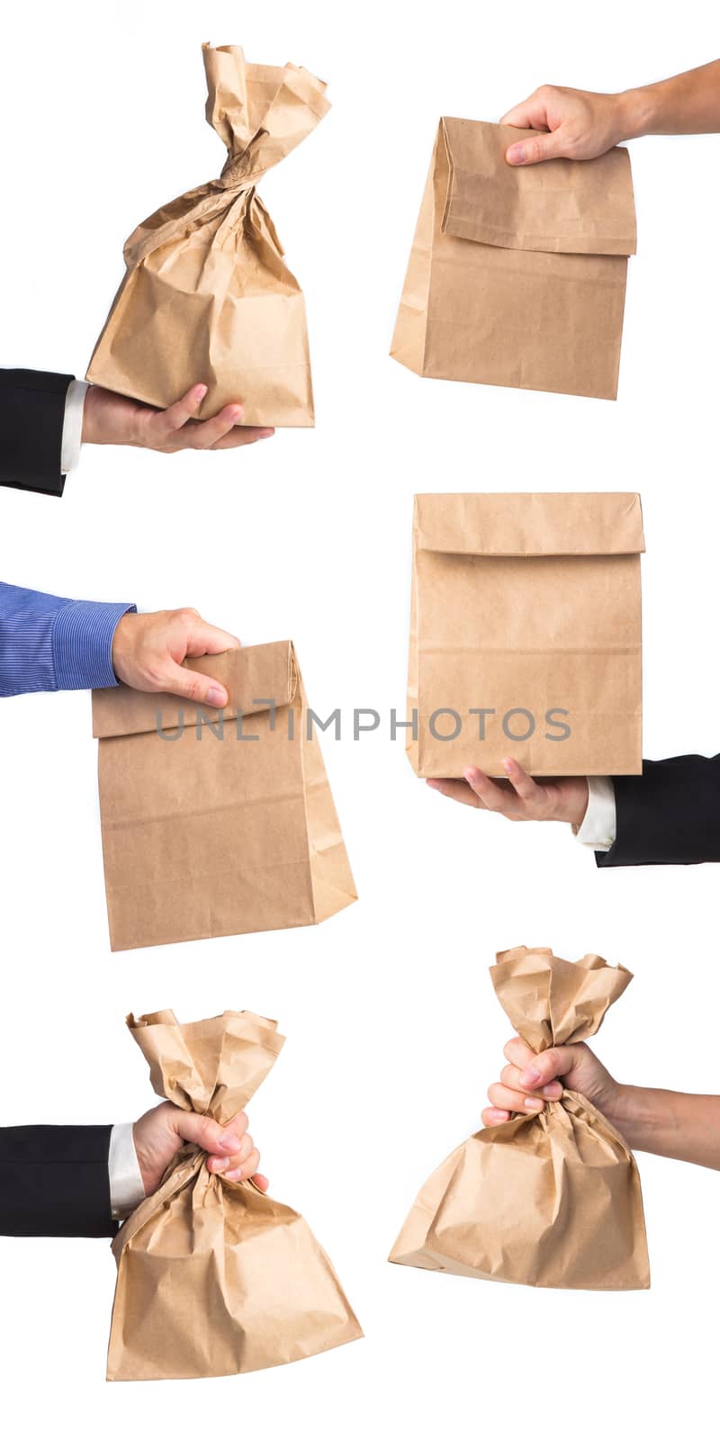 Man holding a brown paper bag by tehcheesiong