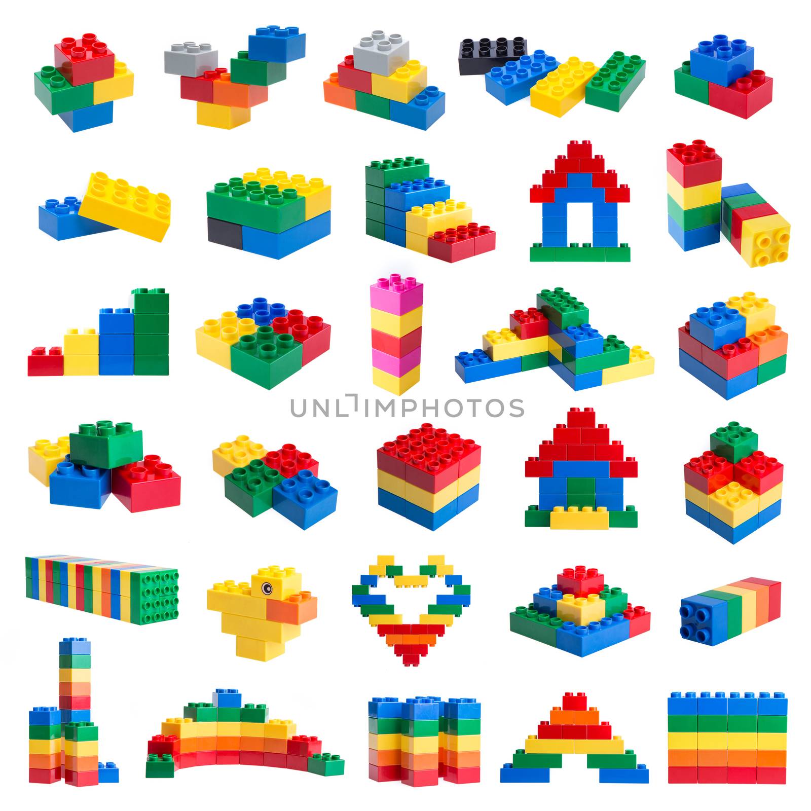 colorful plastic block on white background by tehcheesiong