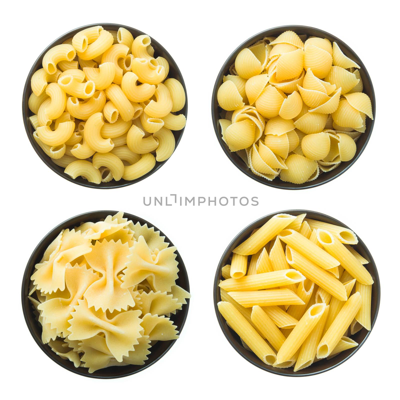raw macaroni isolated on white background
