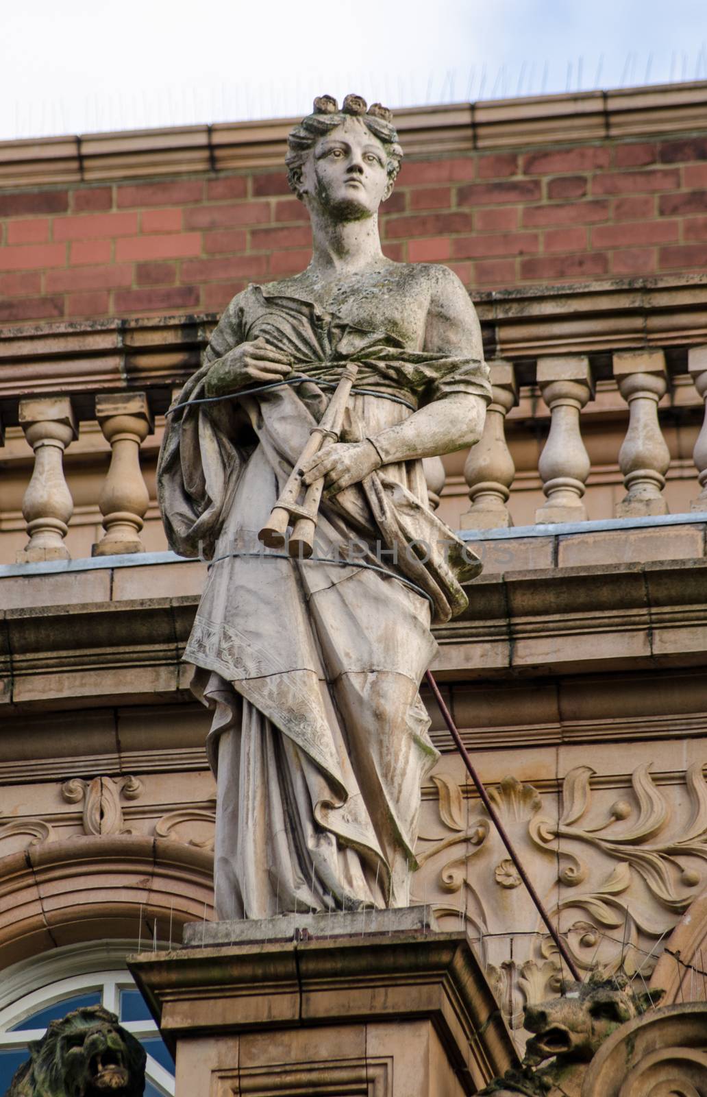 Victorian statue of the Greek Muse of music Euterpe on the exterior of Richmond Theatre.  The building was designed by Frank Matcham and opened in 1899.  