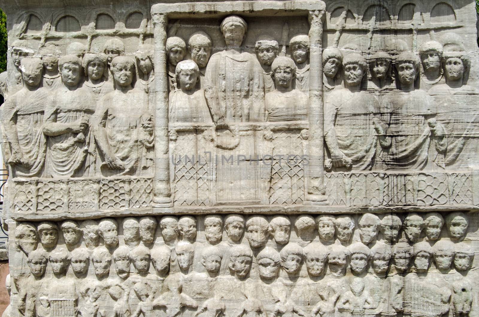Stone frieze sculpture of the Byzantine Emperor Theodosius showing him in a crowd watching a race at the hippodrome in Istanbul, Turkey.