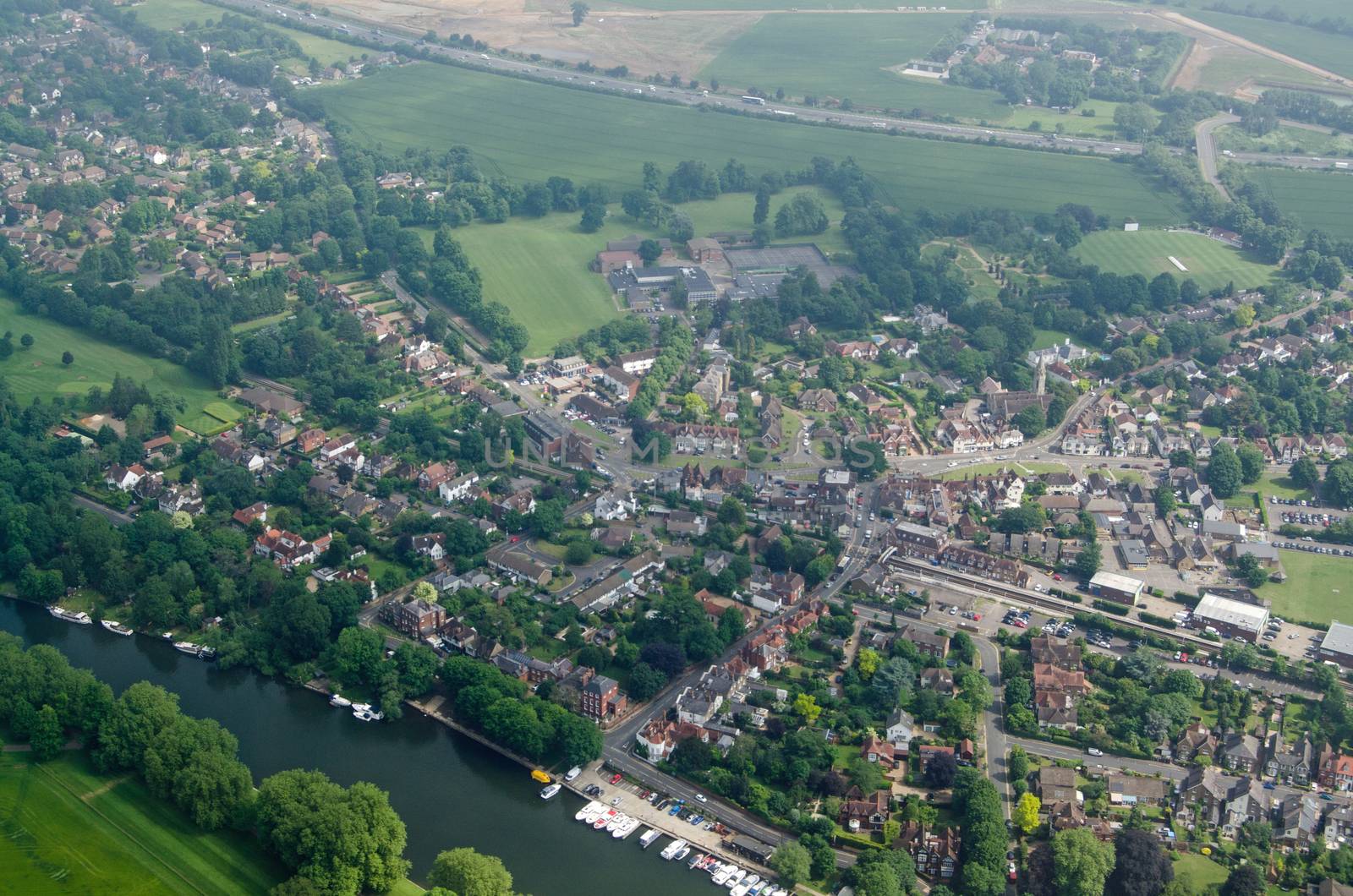 View from a plane of the village of Datchet, Berkshire.  The historic village lies on the banks of the River Thames near Windsor and has the M4 motorway running to the north.