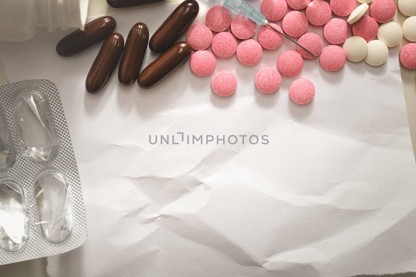 Pile of drugs in pills, tablets and syringes with copy space. by photoboyko