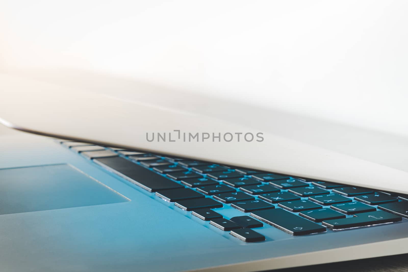 Laptop with a closed lid, close-up view by photoboyko