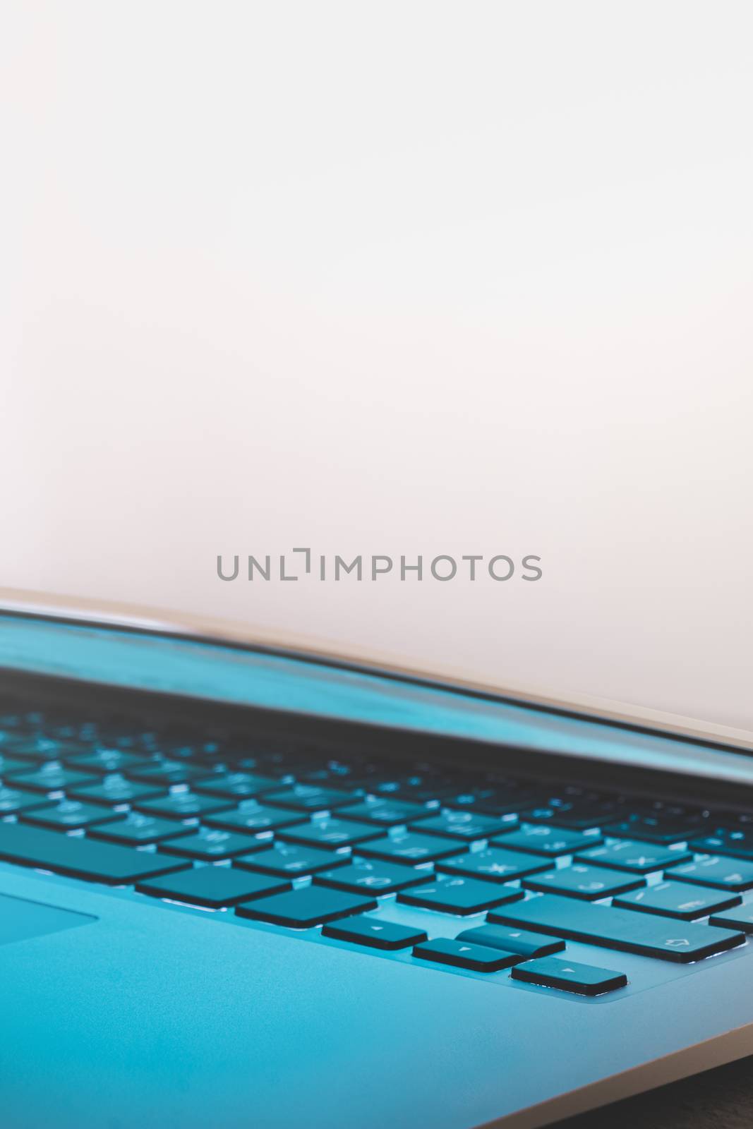 Laptop with a closed lid, close-up view with copy space. by photoboyko