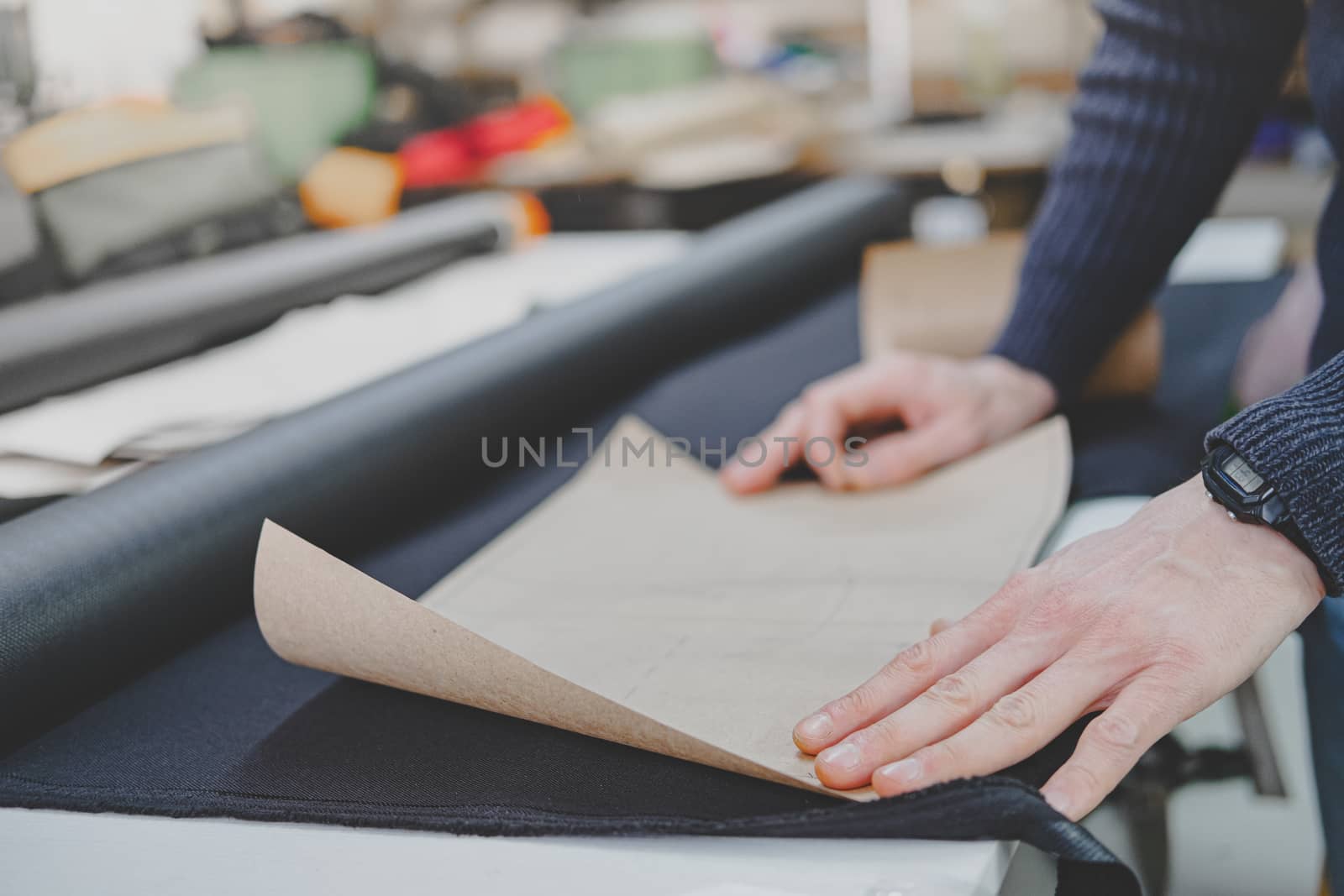 Hands of a worker doing engineering job. Manual labor process, business, startup concept