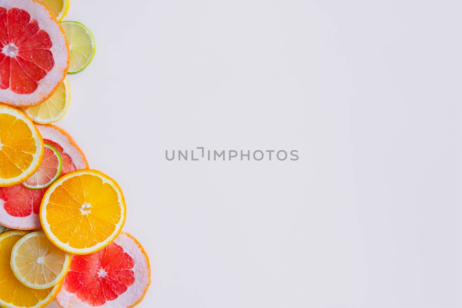 Fresh juicy citrus fruit background with copy space. by photoboyko