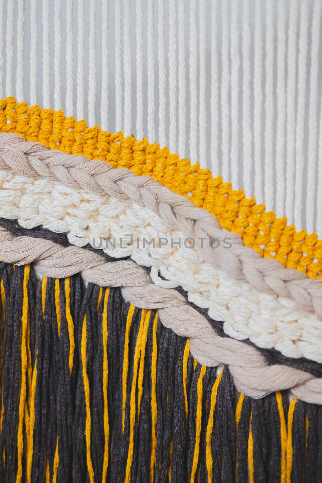 Details of a macrame handcrafted decor. by photoboyko