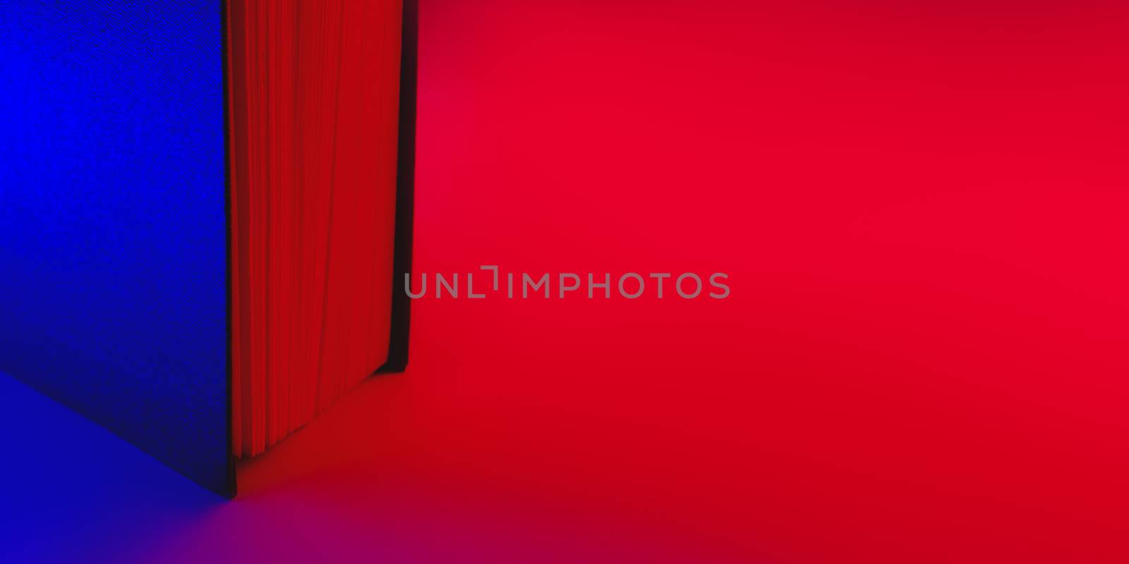 Open book in vibrant blue and red colors. Vivid neon gradients, abstract background image of a book