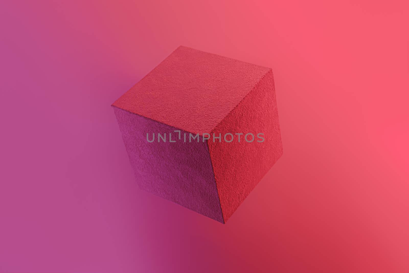 Geometric cube figure in vibrant neon colors. Vivid pink and red gradients, geometric shape, abstract concept