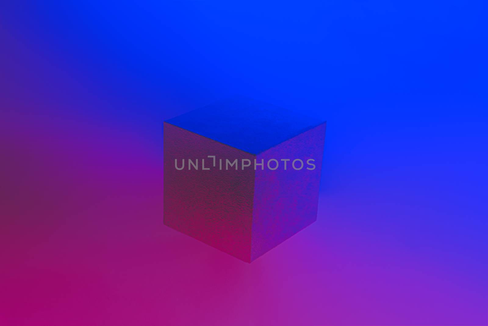 Geometric cube figure in vibrant neon colors. Faded blue and pink gradients, geometric shape, abstract concept