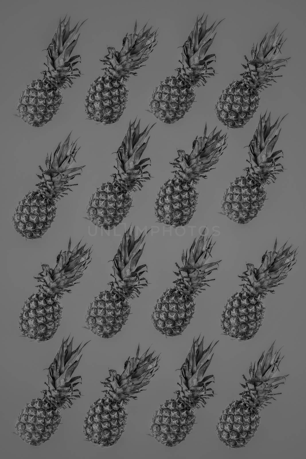 Isolated pineapples pattern on bright vivid turquoise background by photoboyko