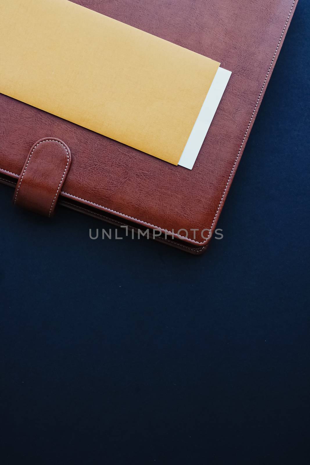 Office desk with briefcase and business card, finance and economy concept