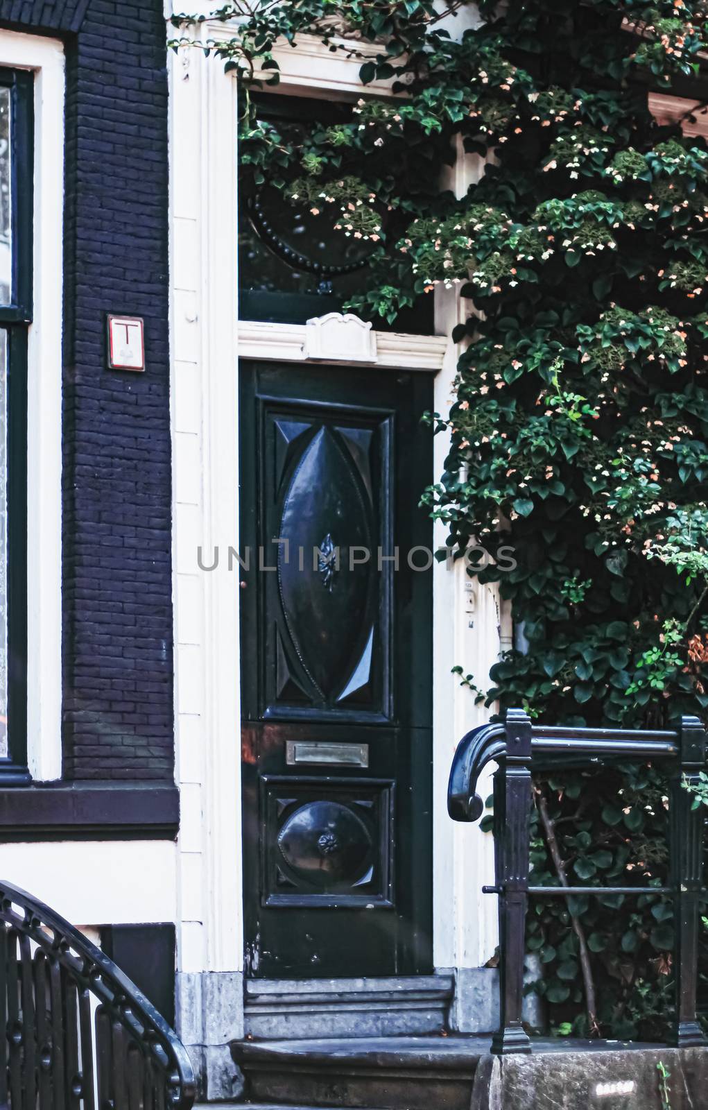 Architectural detail of a building on the main city center street of Amsterdam in Netherlands, european architecture