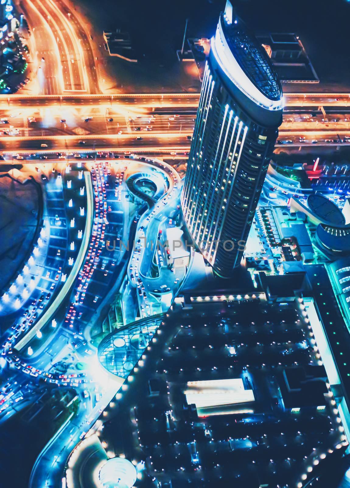 Aerial night view of Dubai in United Arab Emirates, metropolitan cityscape scenery