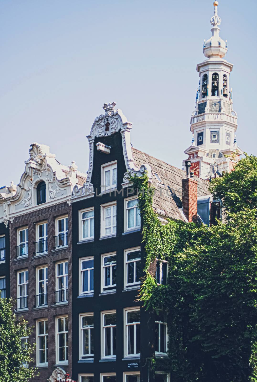 Main downtown street in the city center of Amsterdam in Netherlands by Anneleven