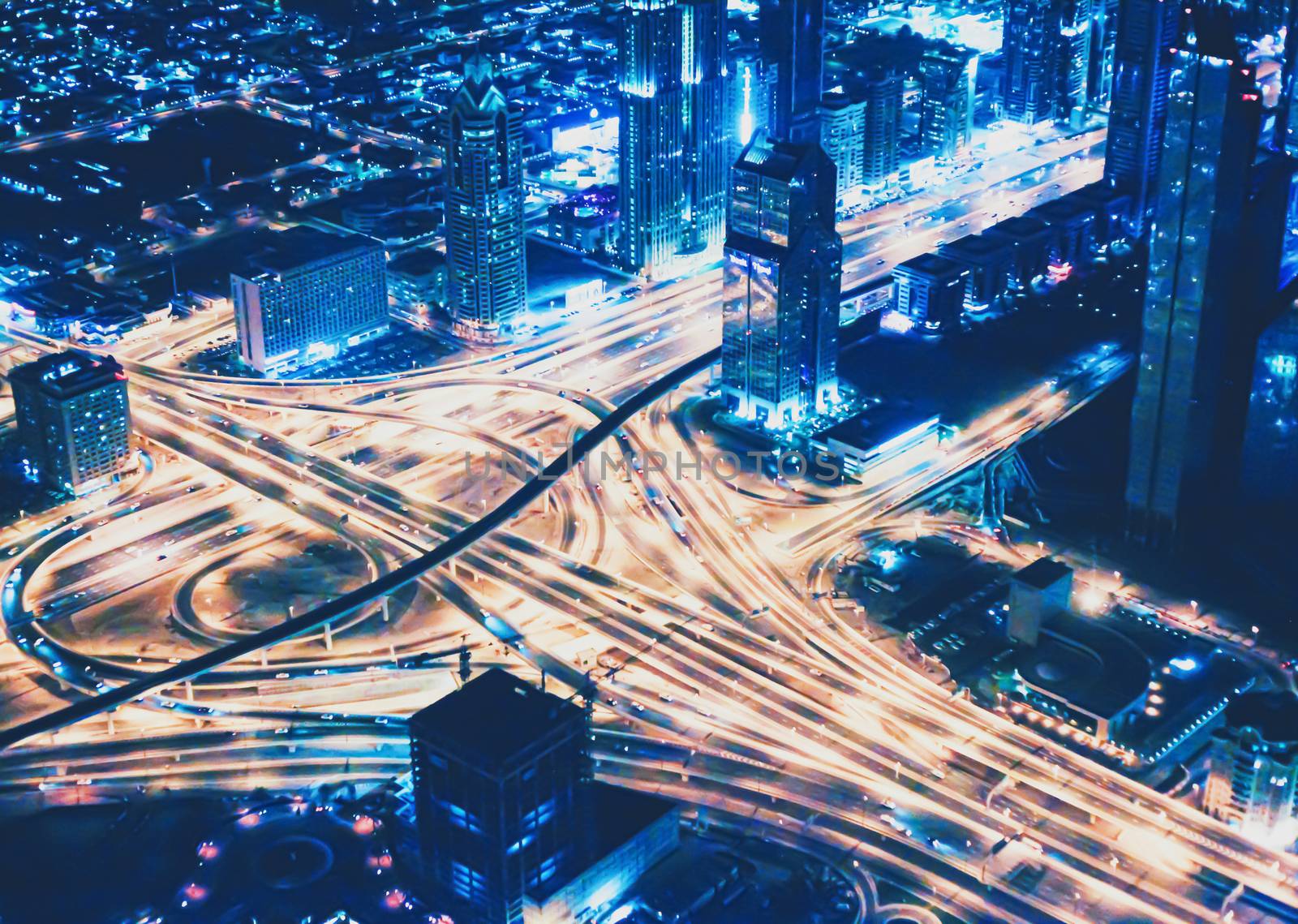 Aerial night view of Dubai in United Arab Emirates, metropolitan cityscape by Anneleven