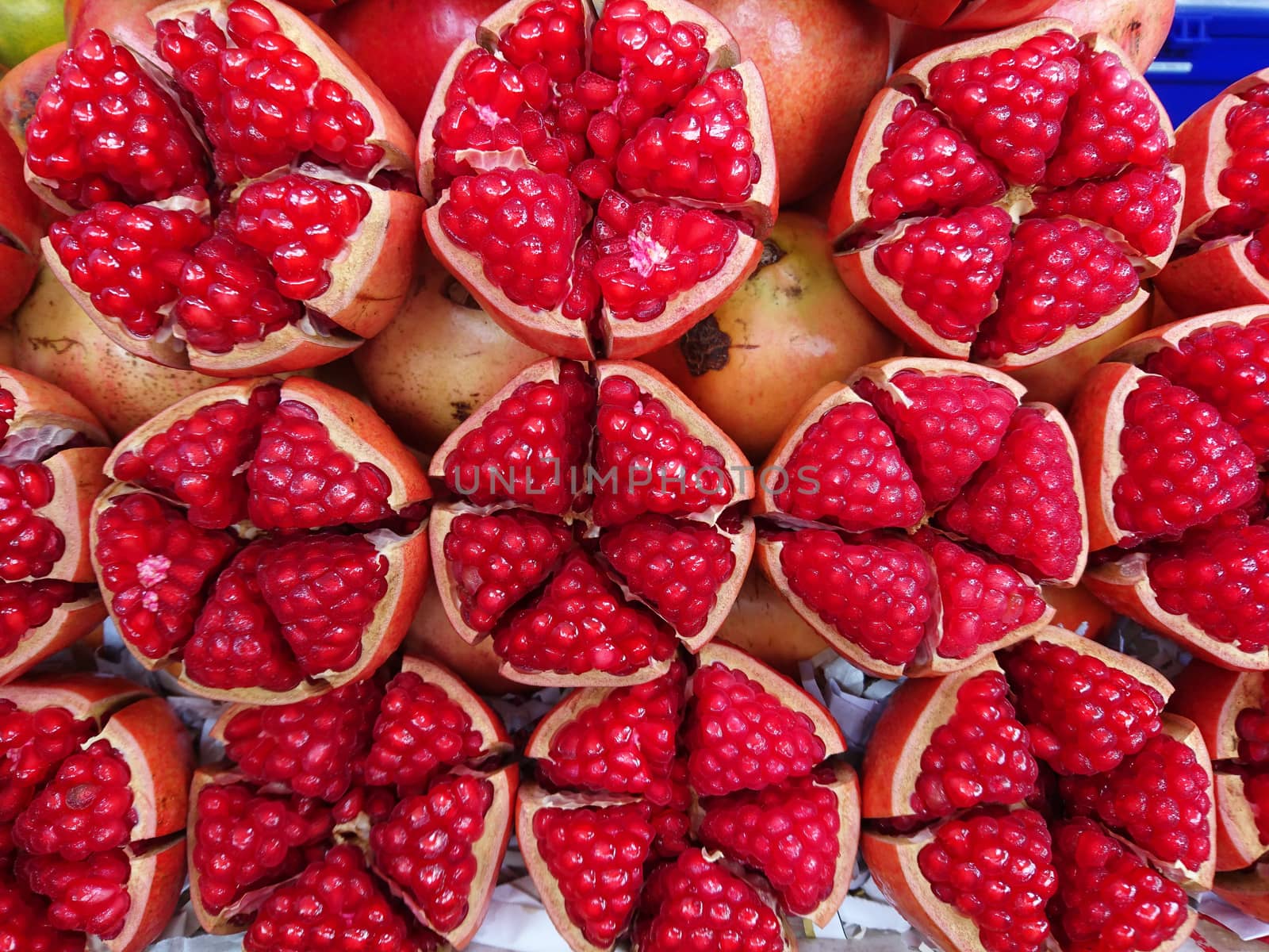 Pomegranate cut of half show for sale in market