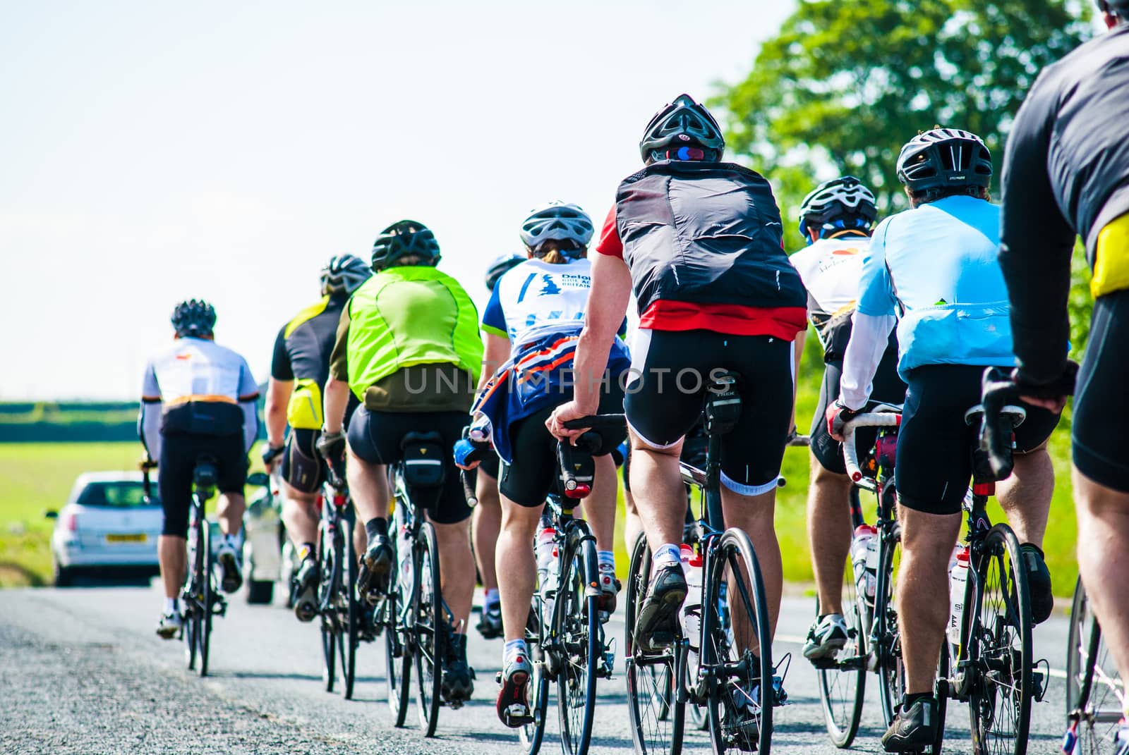 group of cyclists out for a ride in the countryside