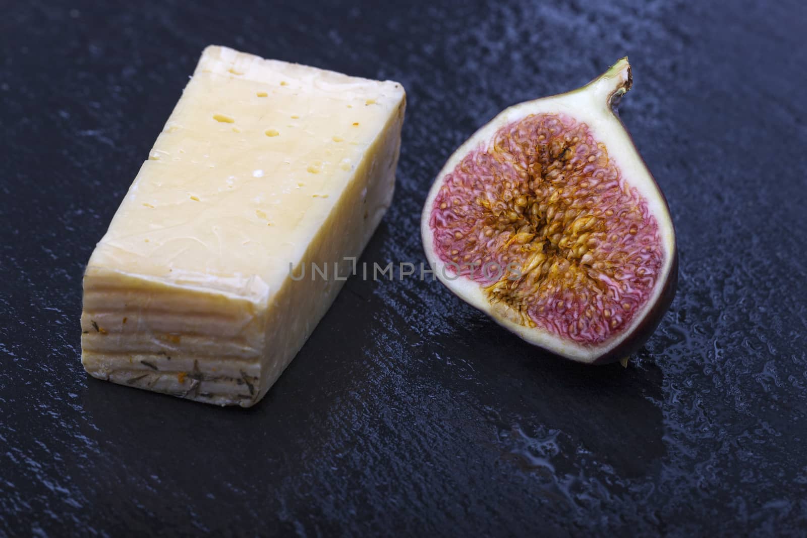 closeup of a fig with cheese by bernjuer