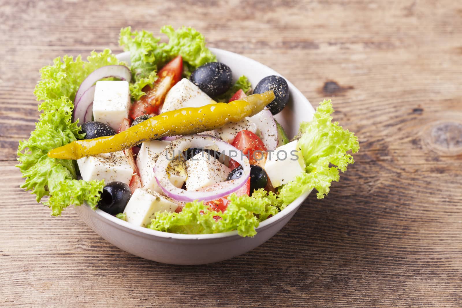 fresh greek salad with olives by bernjuer
