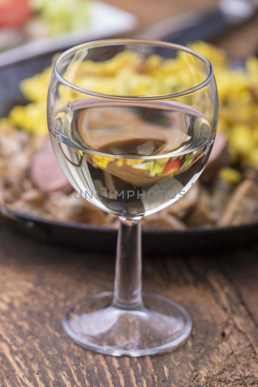 white wine and swabian pork filet with spaetzle on wood