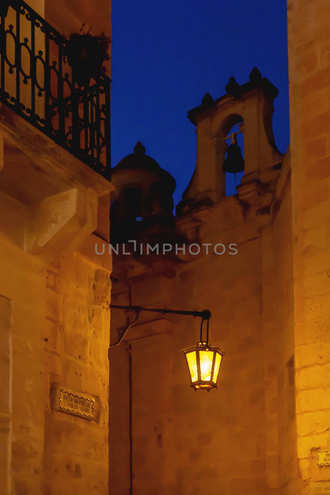 Old fashioned lantern on St.Publius square at night. Mdina, ancient capital of Malta.
