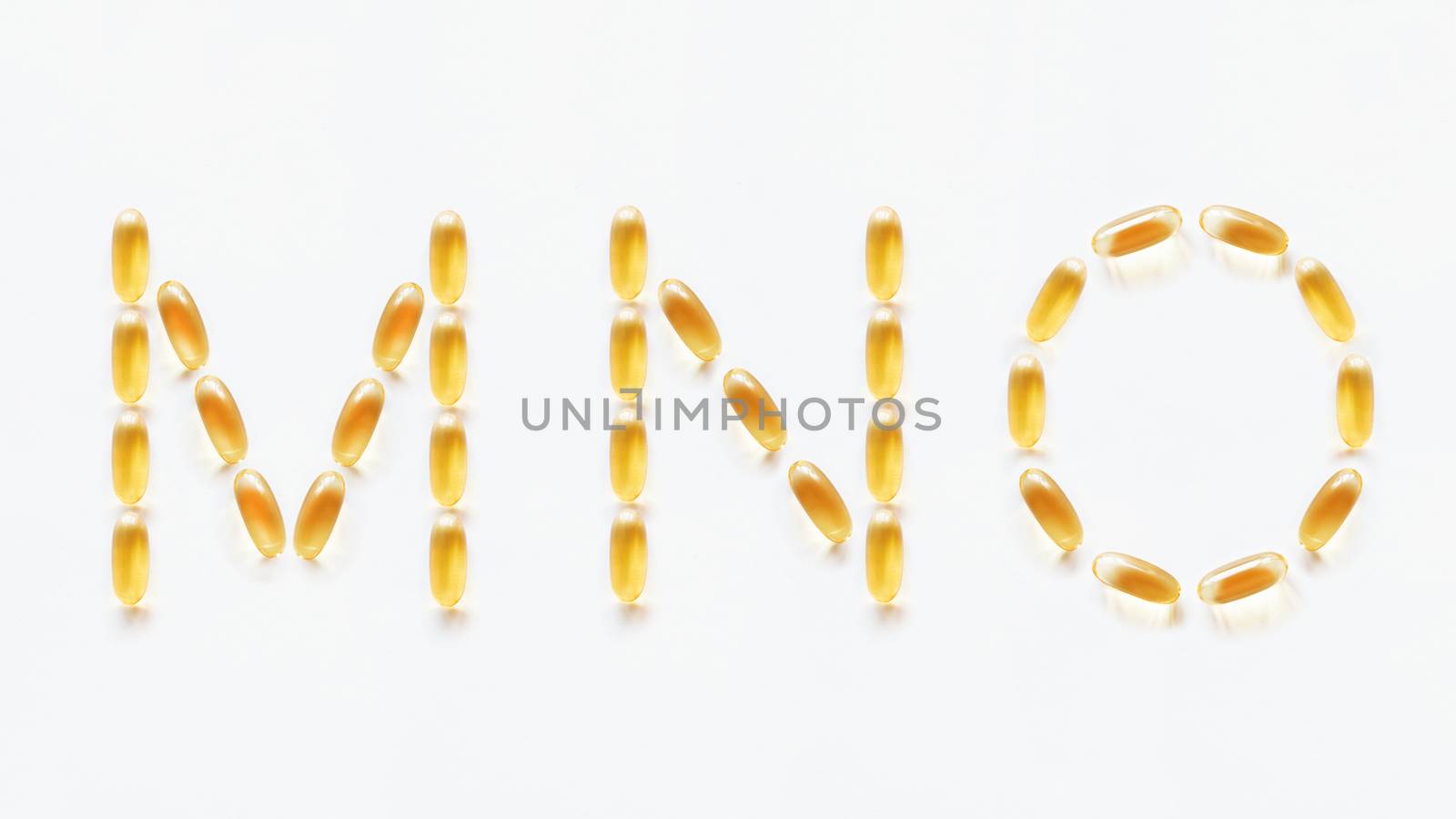 Letters M, N, O made of transparent yellow pills. Part 5 of latin alphabet in medical style. Isolated on white background. by aksenovko