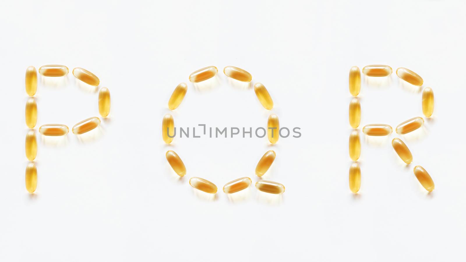 Letters P, Q, R made of transparent yellow pills. Part 6 of latin alphabet in medical style. Isolated on white background.