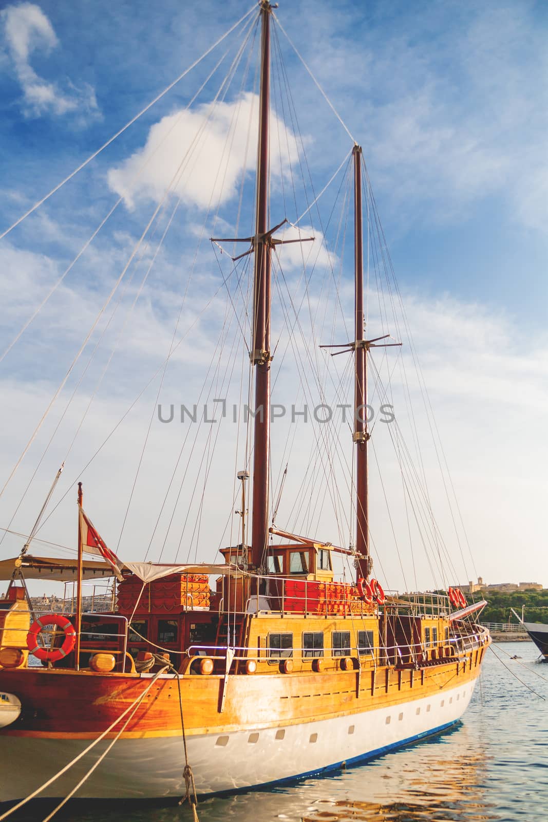 Sailing ship moored on sea embankment, Sliema, Malta.