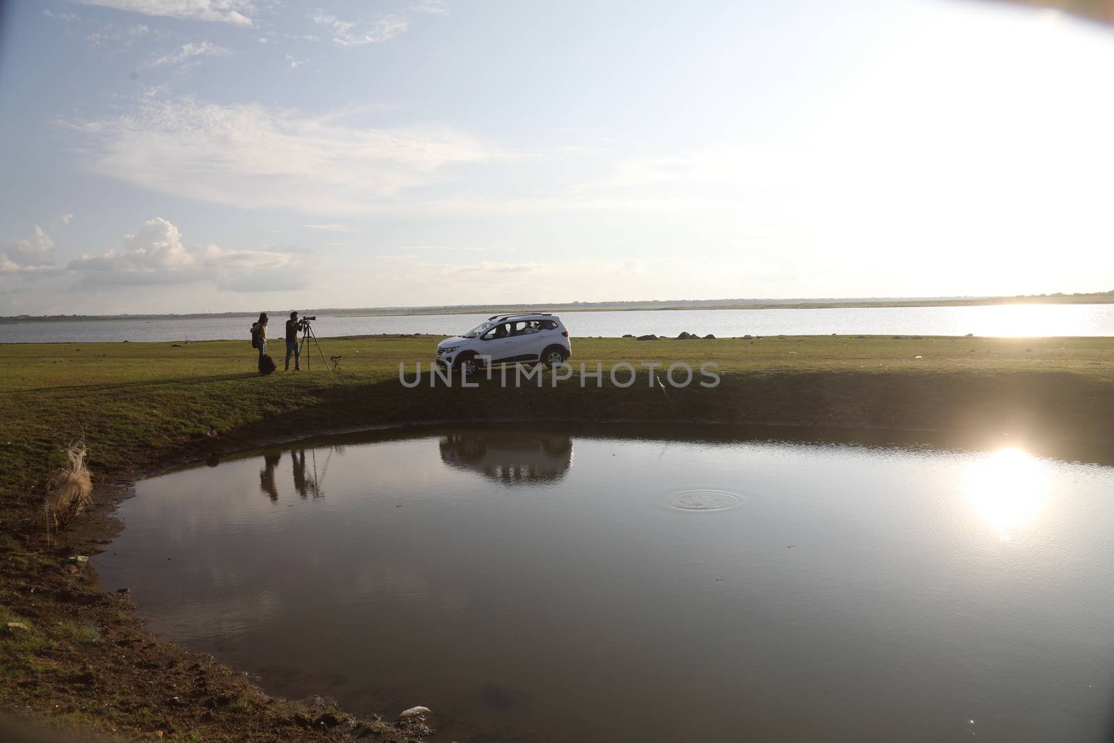 Photographer at Lake in the work