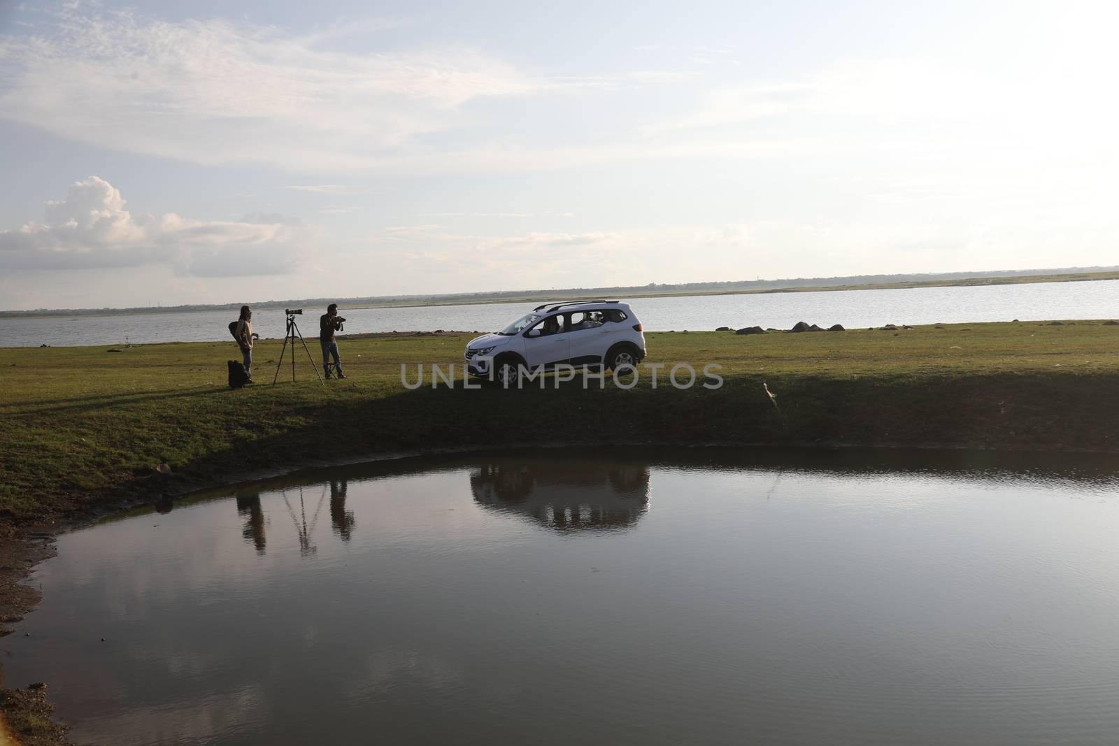 Photographer at Lake in the work