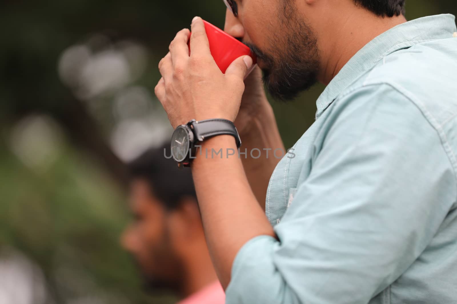Male hand with cup
