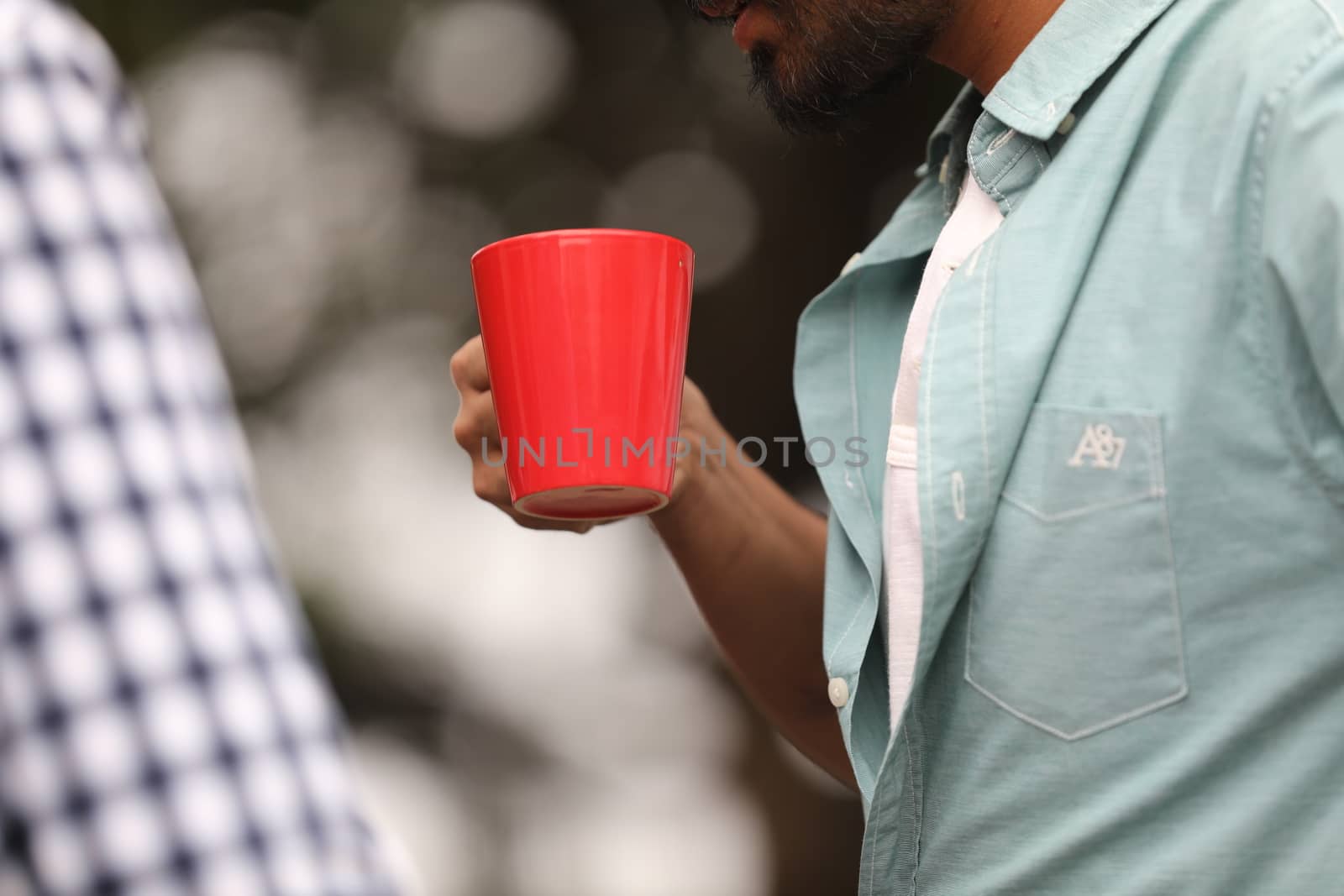 Male hand with cup