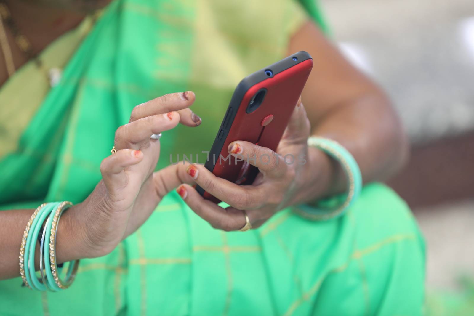 Female hands with cell phone