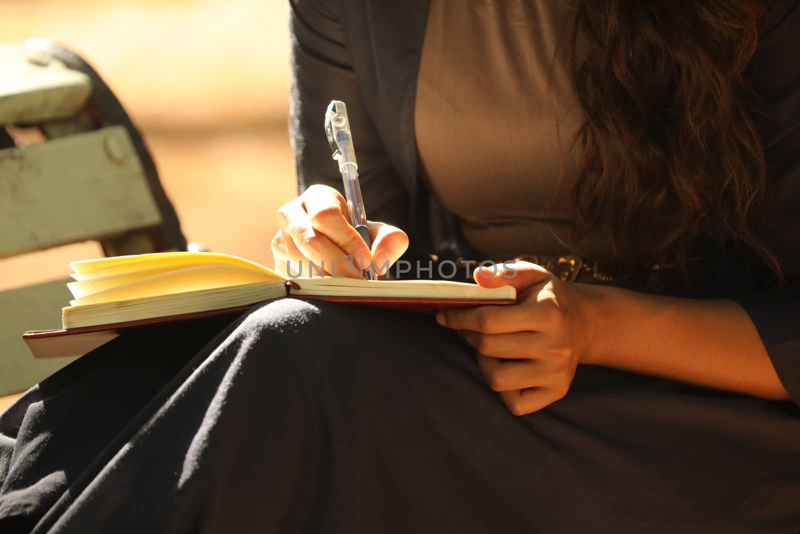 Female Hand with Pen