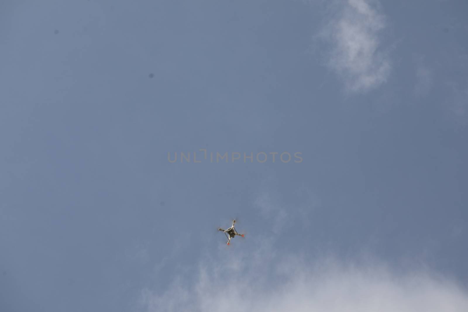 Aerial drone with an action camera