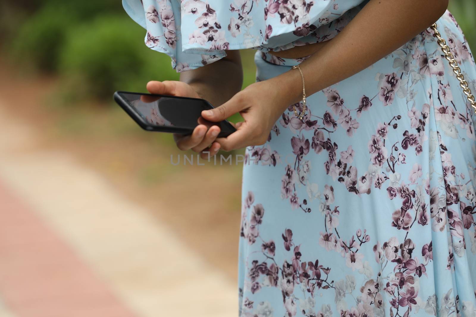 Female hands with cell phone by rajastills