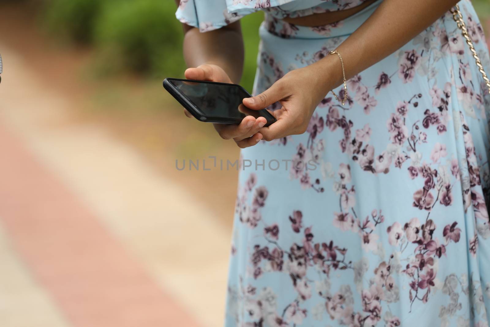 Female hands with cell phone by rajastills