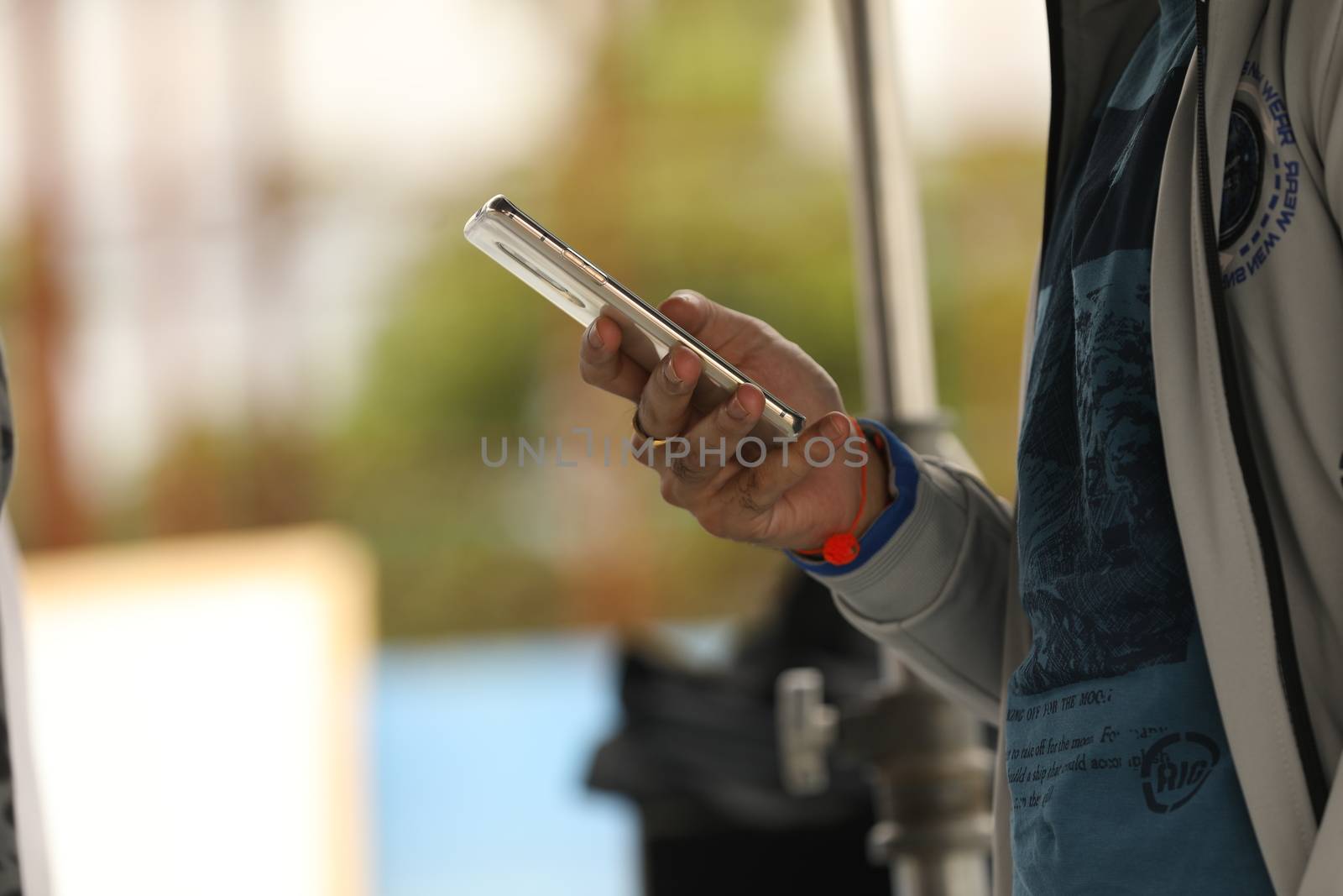 Male Model hands with cell phone by rajastills