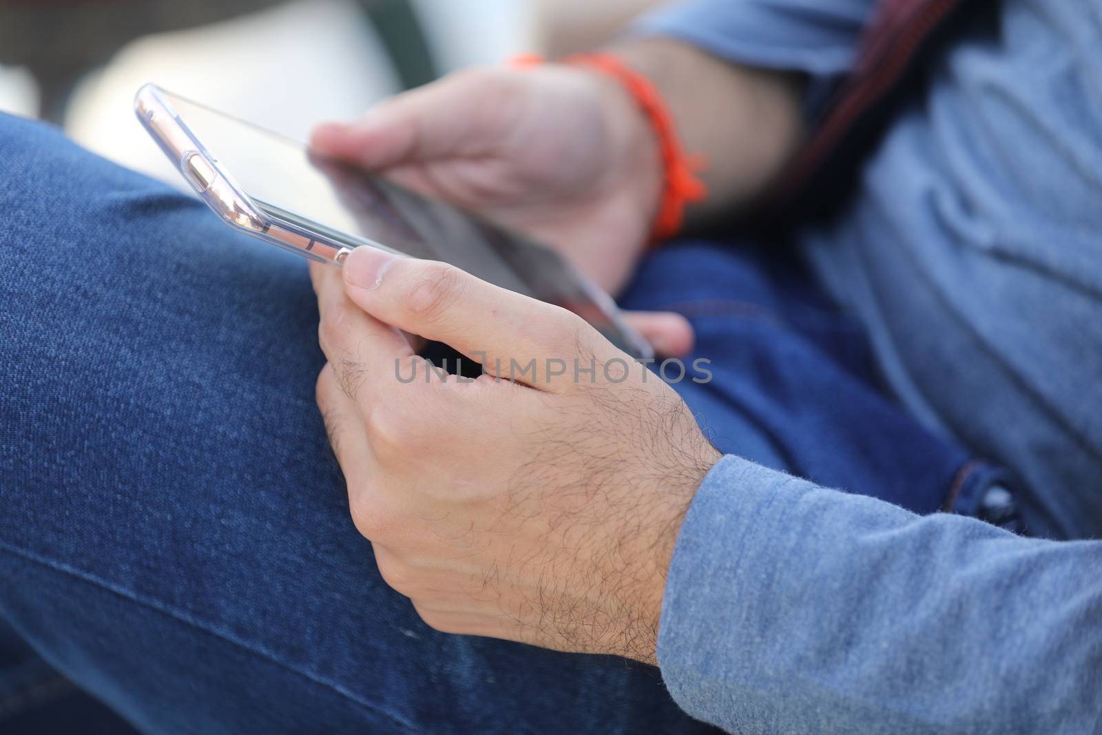 Male Model hands with cell phone