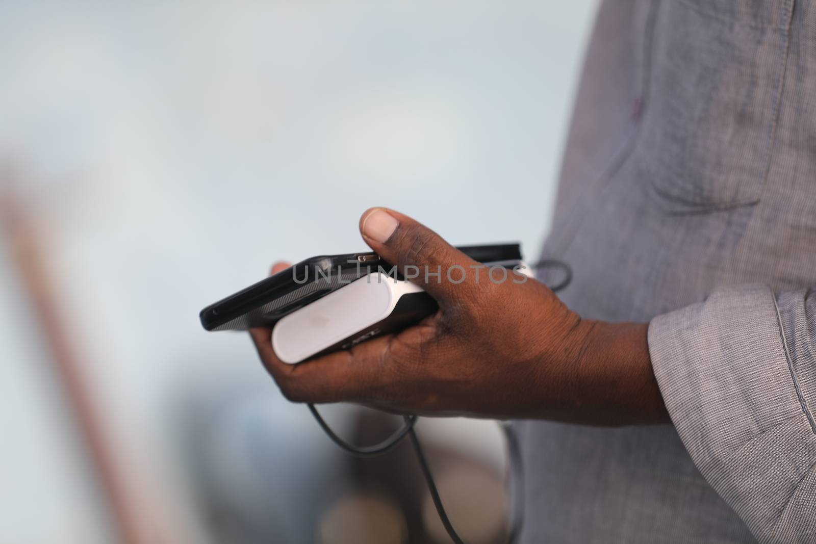 Male Model hands with cell phone