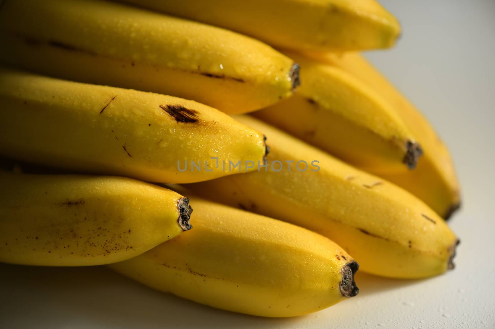 Bunch of raw ripe organic yellow bananas by mady70