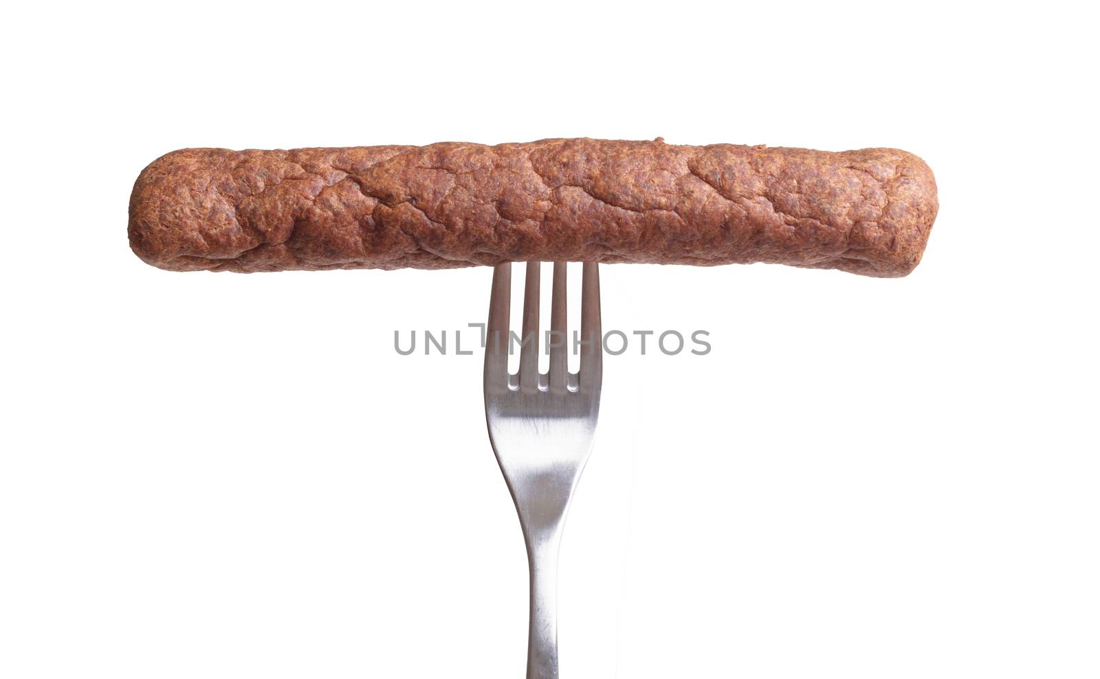 One frikadel on a fork, a Dutch fast food snack, isolated