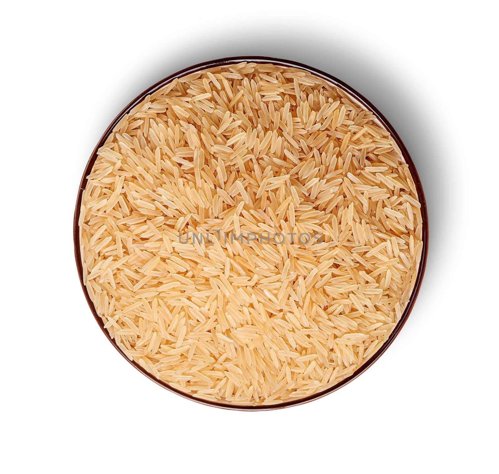 Rice in bowl top view isolated on white background