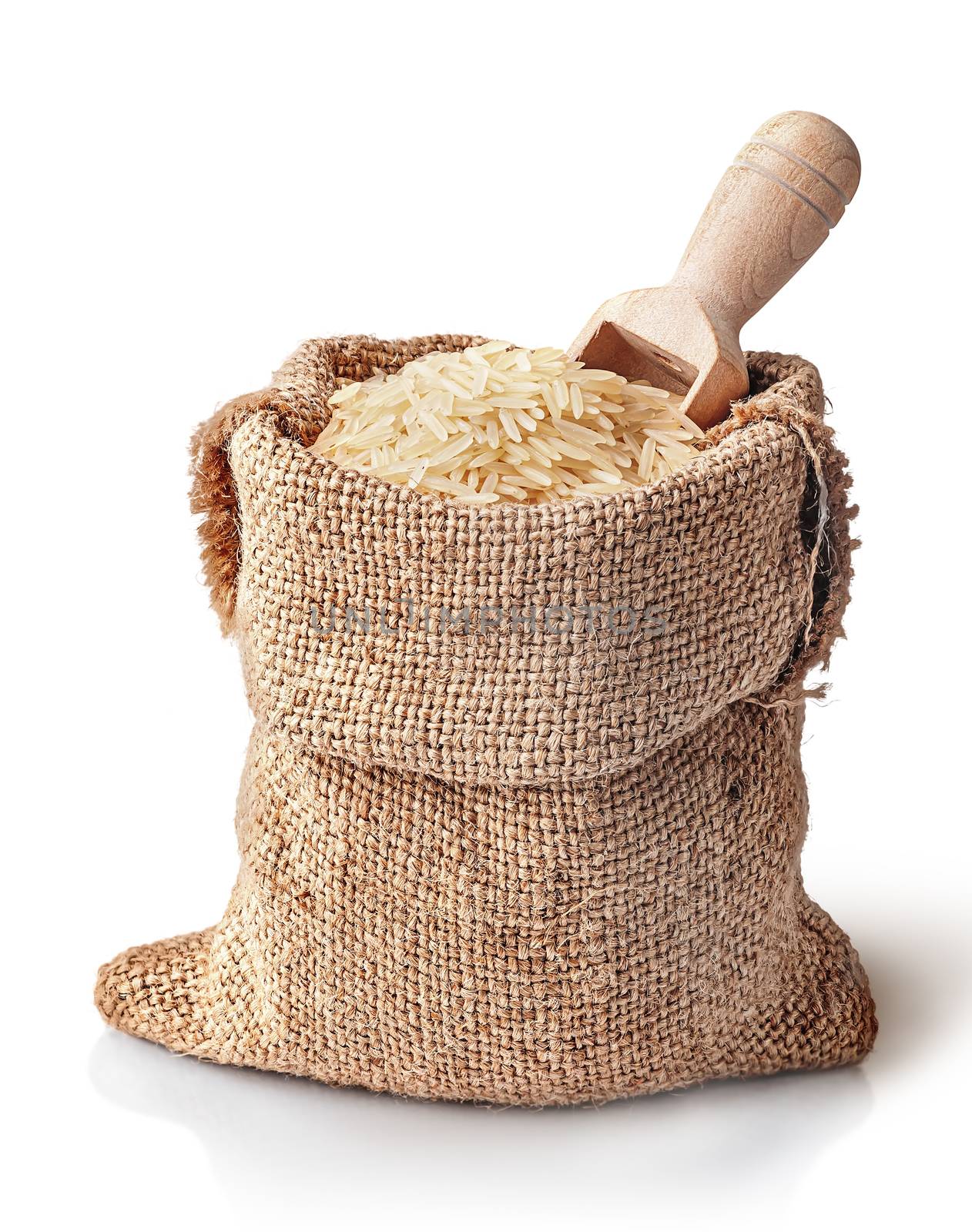 White rice and scoop in sack by Cipariss