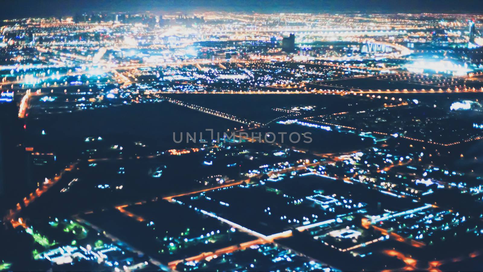 Aerial night view of Dubai in United Arab Emirates, metropolitan cityscape by Anneleven